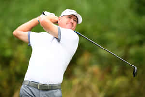 Professional Golfer Steve Flesch In Mid-swing Wallpaper