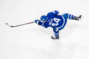 Professional Ice Hockey Player Morgan Rielly In Action Wallpaper