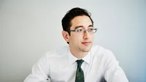 Professional Man Contemplating Wallpaper