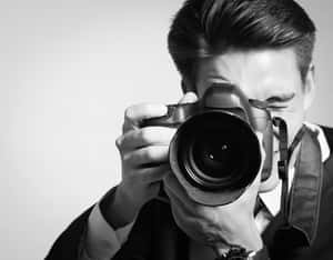 Professional Photographerin Action Wallpaper