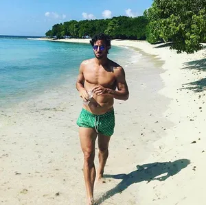 Professional Tennis Player Feliciano Lopez At Beach Wallpaper