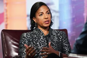 Professional Woman Speakingat Event Wallpaper