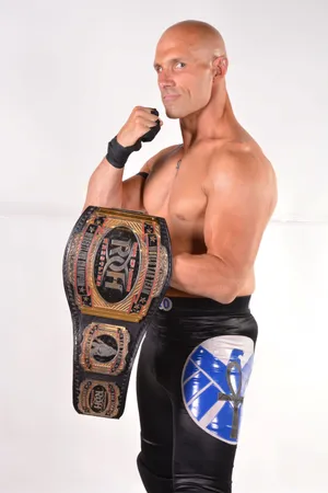 Professional Wrestlerwith Championship Belt Wallpaper