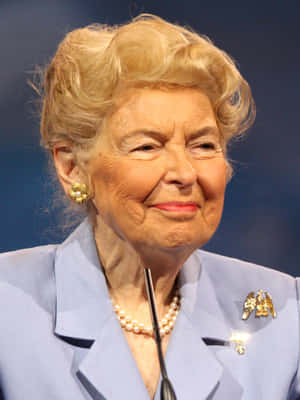 Prominent Conservative Activist Phyllis Schlafly In A Professional Portrait Wallpaper