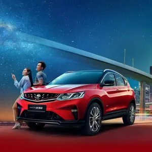 Proton Car Against City Skyline In Nighttime Wallpaper