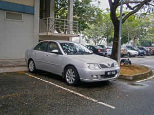 Proton Waja Parked Outdoor Wallpaper