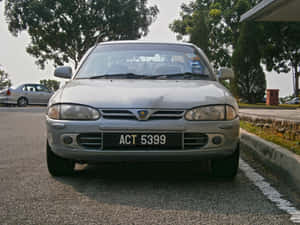 Proton Wira Parked Outdoors Wallpaper