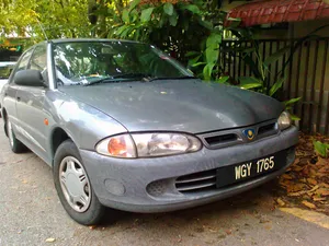 Proton Wira Parked Outdoors Wallpaper