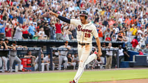 Proud Georgia Fan Waves Atlanta Braves Flag Wallpaper