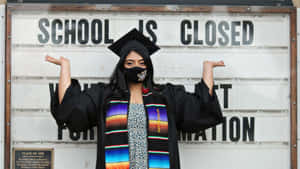 Proud Grads Celebrating Their Graduation Ceremony Wallpaper