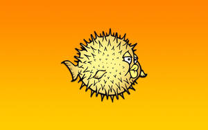 Puffer Fish Gracefully Swimming Through The Deep Blue Ocean. Wallpaper