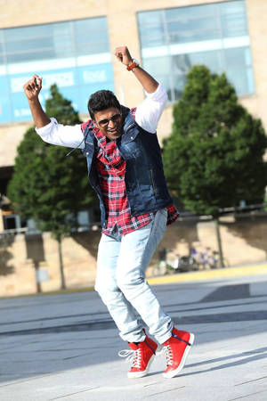 Puneeth Rajkumar Happy Dance Wallpaper