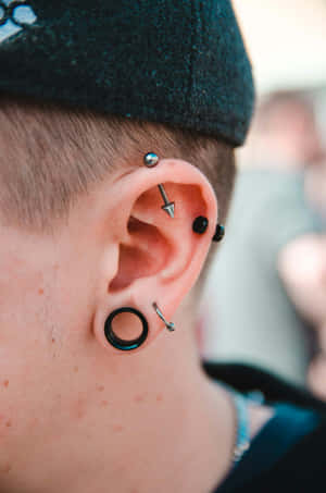 Punk Ear Piercingsand Stretching.jpg Wallpaper