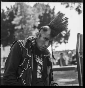 Punk Portrait_ Mohawk And Chains Wallpaper