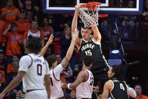 Purdue Basketball Player Dunking Wallpaper