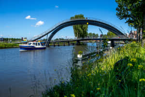 Purmerend Arch Bridge Over Waterway Wallpaper