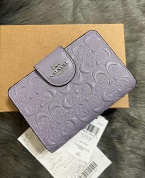 Purple Coach Walleton Box Wallpaper