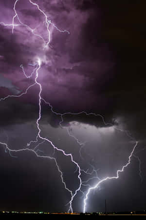 Purple Lightning In Dark Sky Wallpaper