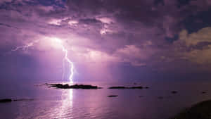 Purple Lightning Over Water Wallpaper