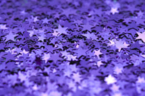 Purple Stars On A Purple Background Wallpaper