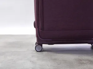 Purple Suitcase Closeup Wheels Wallpaper