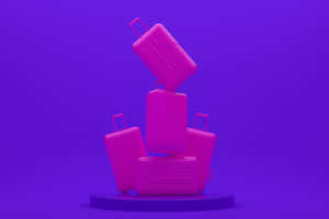 Purple Suitcase Stackon Blue Background Wallpaper