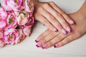 Purple Tipped French Manicurewith Flowers Wallpaper