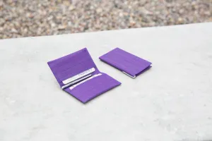 Purple Walletand Cardson Concrete Wallpaper