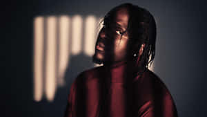 Pusha T Intense Gaze Portrait Wallpaper