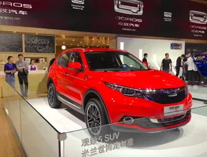 Qoros 5 Suv On Mountain Road Wallpaper