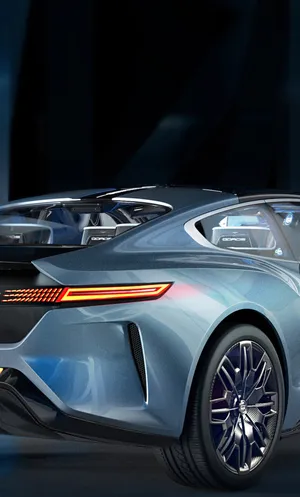 Qoros Luxury Sedan Driving On The Road Wallpaper