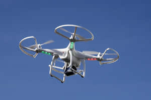 Quadcopter Drone In Flight Wallpaper