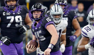 Quarterback Actionin Game Wallpaper