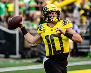 Quarterback Bo Nix Action Shot Wallpaper