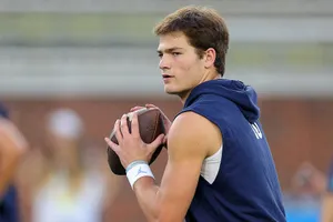 Quarterback Drake Maye Preparation Wallpaper