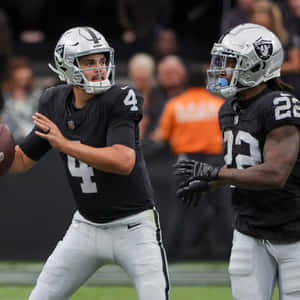 Quarterback Handoff Football Game Wallpaper