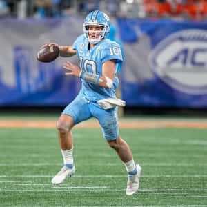 Quarterback In Action Drake Maye Wallpaper