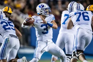 Quarterback Jaren Hall Preparesto Pass Wallpaper