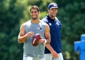 Quarterback Jimmy Garoppolo In Action Wallpaper