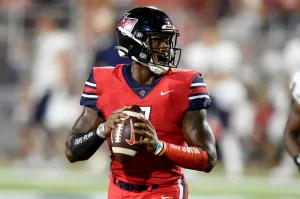 Quarterback Malik Willis Action Shot Wallpaper