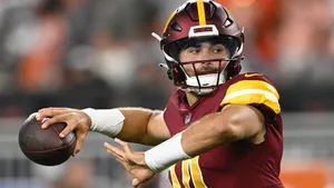 Quarterback Preparingto Throw Football Wallpaper