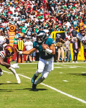 Quarterback Scramble Football Game Wallpaper