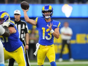 Quarterback Throwing Football Game Wallpaper