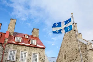 Quebec Fleurde Lis Flag Waving Wallpaper
