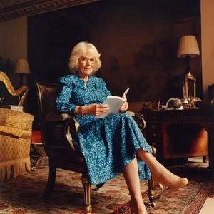 Queen Camilla Posing With Glasses Wallpaper