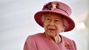 Queen Elizabeth In Pink Attire Wallpaper