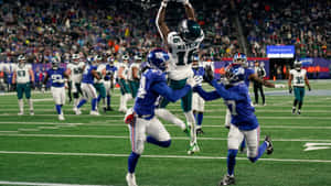 Quez Watkins Mid Air Catch Against Giants Wallpaper