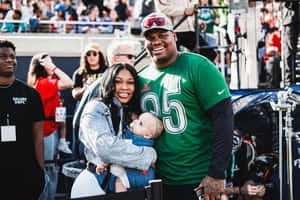Quinnen Williams Family Moment Wallpaper