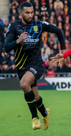 R K C Waalwijk Playerin Action During Match Wallpaper