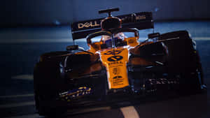 Race To Victory In The Mclaren F1 Wallpaper